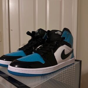 Nike Air Jordan High-Tops in Black, Blue, and White